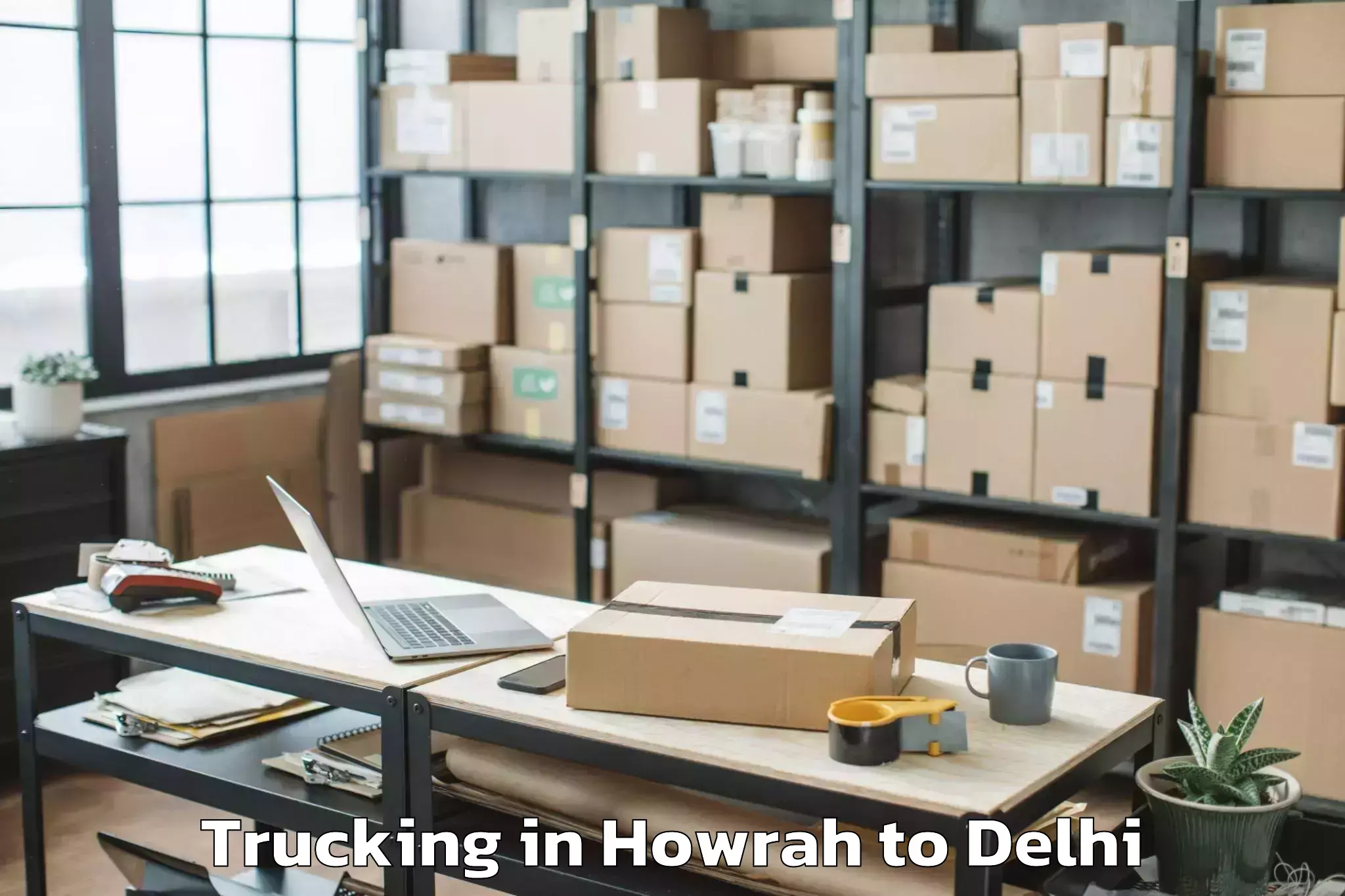 Book Howrah to Naraina Industrial Estate Trucking Online